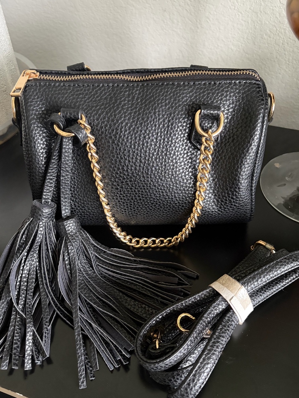 Black Pebbled Faux Leather Crossbody Bag with Gold Chain and Tassels